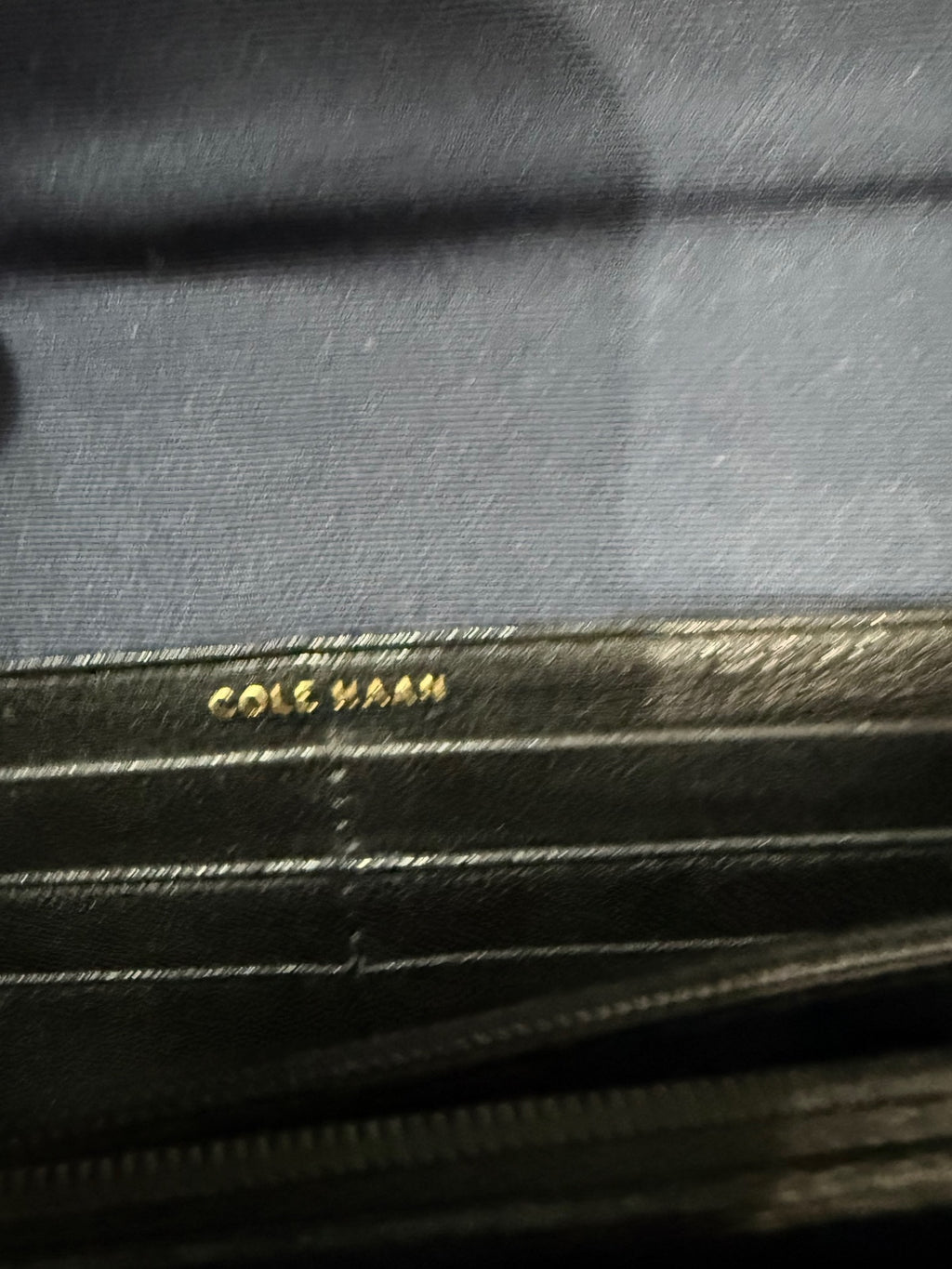 Cole Haan black lizard/snakeskin-embossed leather continental flap wallet