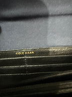 Cole Haan black lizard/snakeskin-embossed leather continental flap wallet