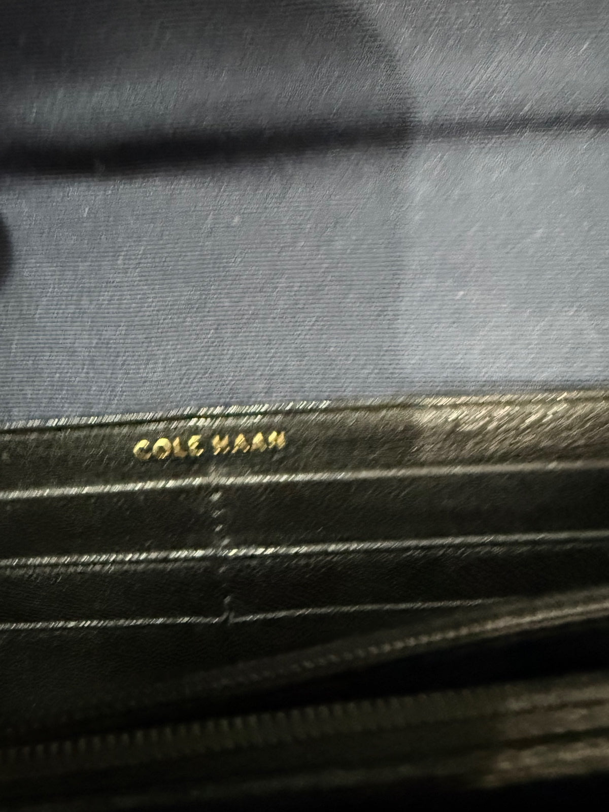 Cole Haan black lizard/snakeskin-embossed leather continental flap wallet