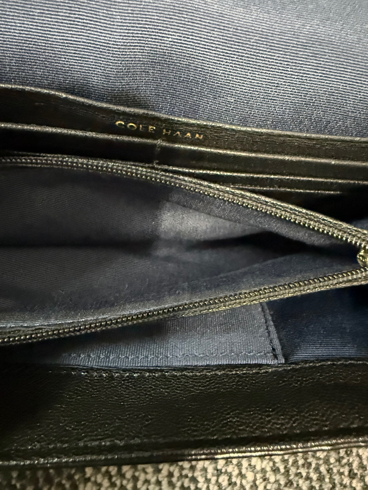 Cole Haan black lizard/snakeskin-embossed leather continental flap wallet