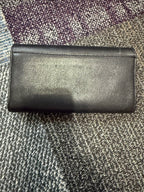 Cole Haan black lizard/snakeskin-embossed leather continental flap wallet